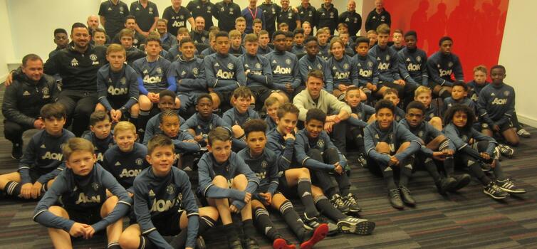 Michael Carrick with Manchester United Foundation Phase players